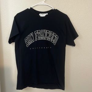 adika never worn graphic tee